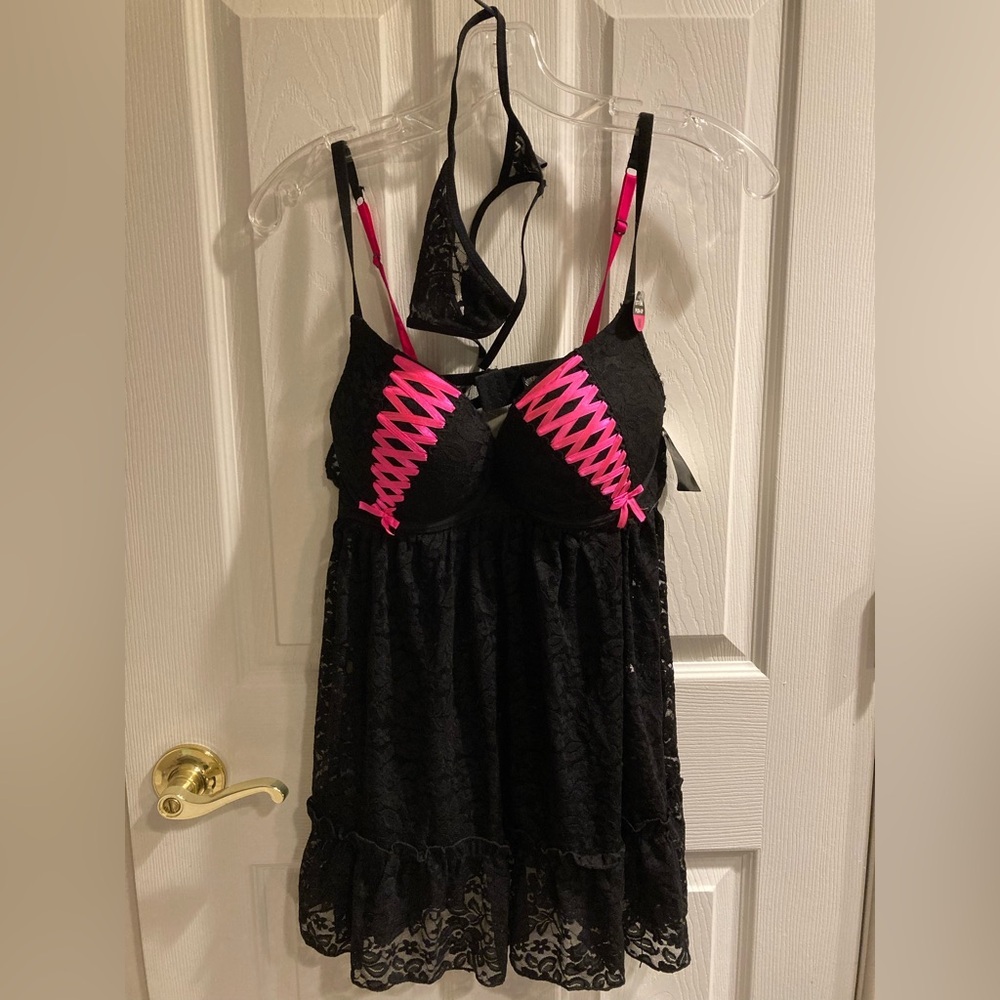 Baby doll lingerie, black lace with thong and pink. Size medium. Push up bra